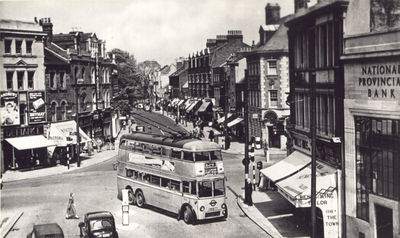 Trolley bus turning from Town into London Road
Captioned "Enfield, cross roads looking up Silver Street". The trams were abolished in 1938 and the trolley buses took their place for a few years.
Keywords: trolleybuses;road transport;The Town