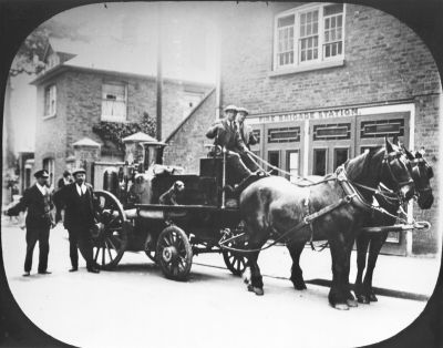 Enfield Town Fire Brigade
Horse drawn fire engine outside fire brigade station in Little Park Gardens. The steam pump had been purchased on 1899, but it was little used because two horses were required to pull it and only one at a time was normally available. Note on print says "after 1918". [i]History of Enfield, vol.2, page 225[/i]
Keywords: fire stations;1910s;horses