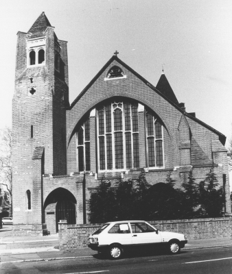 Church of St. Michael
Designed by W. D. Caröe and built in 1901. Very individual Arts and Crafts Gothic style in red brick with stone dressings, tiled roof, tower, elaborate east window and wide buttresses. Sensitively converted into flats after being made redundant in 1982. - [i][Treasures of Enfield][/i]
Keywords: churches;Lower Edmonton;St Michaels Church;Bury Street;Grade II listed