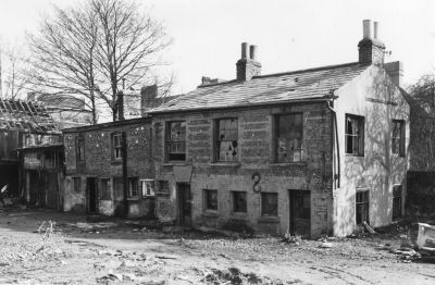 Laing's Garage
Site showing the old houses after the old cars and rubbish were cleared away prior to demolition in 1979.

