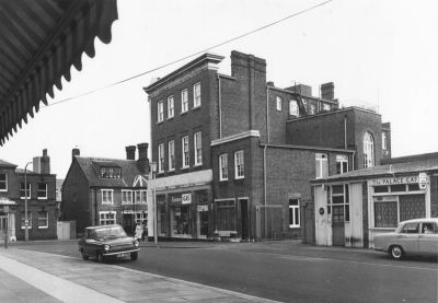 Eastern Gas showroom and The Palace Cafe
The entrance between the gas showroom and the cafe leads to the gas company's yard and workshops.
Keywords: gas;caterers