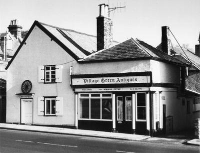 Hoppers Road, 212 (The old bakery)
Late 7th - early 18th century. Listed grade II. In the early and mid 19th century it was part of a farm property with fields extending down the hill to Green Lanes. The building continued as a bakery until the 1960s. - [Treasures of Enfield, p.129]
[i]Alistair Harley writes: "You have a picture on your website that is said to be the baker into the 1960's. I lived in Arundel Gardens until the 1960's and used the baker called Chalkleys on the corner of Hoppers road and The Green. This was the only baker in the area apart from the one on the Broadway. ... In the 1960's when I shopped at the bakery it was the corner shop that sold the bread. Where it was made I know not as all I was interested in was purchasing the lovely rolls they sold. The ovens in the old bakery next door was most probably where the bread was produced. It was common in those days for bakers to bake their own products onsite. One thing I am certain is that any shop at 212 did not in my memory sell bread. I went up and down that road on a daily basis." - Can anyone clarify whether this old bakers was in fact in use until the 1960s?[/i]
Keywords: 17th century;18th century;bakeries;shops;Grade II listed
