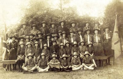 Guide and Brownie company of St. James' Church, Enfield Highway
Photograph taken in the early 1920s. P. Paye writes: "Dinah Tinsley is holding the flag on the left, Ruby Collins is third from the left in the back row and my aunt Amelia Paye is second from left in the second row".
Keywords: 1920s;flags;St James Church;guides;brownies