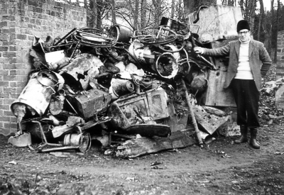 Clearing the old course of the New River, Gough Park, 1965
EPS Vice-President Robert Sykes of Gough Park Cottage with some of the rubbish collected.
Keywords: 1960s;litter;New River