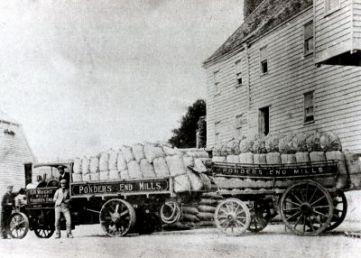 Steam lorry and separate wagon, both loaded with bags. Ponders End Mills.
Lorry inscribed "G. R. Wright / Miller / Ponders End"
George Reynolds Wright died in 1914. - [i]History of Enfield[/i] vol.3, p.68
Keywords: road transport;road transport;lorries;mills;industry