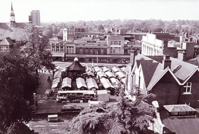 View south from St Andrew's church tower, 1975
Keywords: 1970s;market places;markets;shops