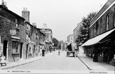 Baker Street
Looking north from a viewpoint just north of Gordon Road. 

[i]Reproduction right held by Enfield Local Studies Library and Archive.[/i]
Keywords: roads and streets;horse-drawn vehicles;shops