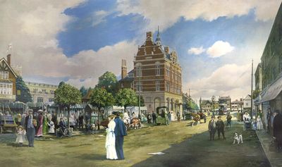 Enfield Town and the market in 1910
[i]Extracts from text printed below the print:[/i] "Enfield Town market, held on a Saturday, was both a shopping centre and a meeting place for most of the local population. ... The market house was erected in 1904 to commemorate the coronation of King Edward VII two years earlier. Overlooking the Market Square is the 'Kings Head', a neat gabled design of 1899 which replaced a much earlier building, the original Kings Head was built in the 17th century. ... Electric trams, then the last word in modernity, had reached Enfield in the early summer of 1909 amid a great blaze of publicity. ... The most remarkable building in the picture is the London and Provincial Bank (now Barclays Bank). It was built in 1897 to the design of W. Gilbee Scott, a local architect who lived in Waverley Road and who also designed Edmonton Town Hall. The Bank was built by Alan Fairhead. The Bank replaced the old 'Greyhound Inn', an early 17th century building, used in its later years as a courthouse and local government offices. ... The Town, with its pavements and market square edged with small trees and its lack of heavy traffic, made Enfield a very pleasant provincial town. Its subsequent change is a matter of great regret to those of us who remember.
[Signed] W G Monk
Keywords: tramcars;markets;FP2